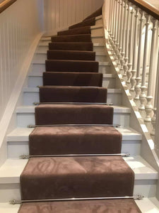 Carpets with stair rods